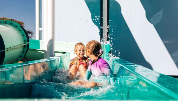 Kids on the water slide at the Cowell Foreshore (District Council of Franklin Harbour)