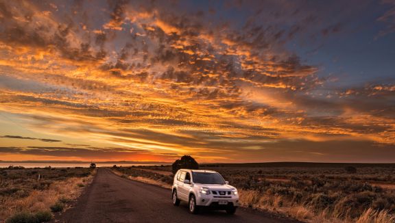 Driving at sunset near Whyalla (South Australian Tourism Commission)